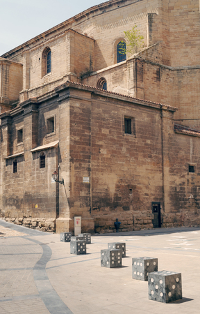Paved street of old houses and lamps in the Spanish city of Vitoriaの写真素材