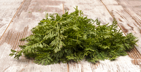 Parsley surrounded by rustic background
