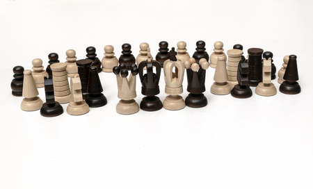 Chess pieces on a wooden board