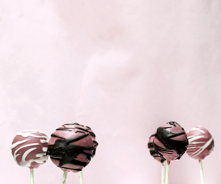 Lollipop cupcake surrounded by rustic backgroundの写真素材