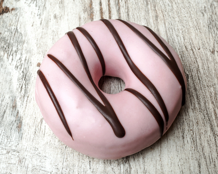 Donut surrounded by rustic backgroundの写真素材