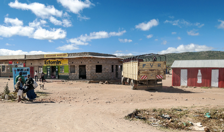 NAIVASHA, KENYA - MAY, 2014: Typical shopping street scene with pedestrians in Naivasha, Kenyaのeditorial素材