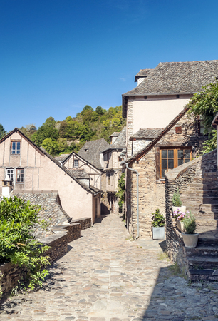 Streets of Conques in the mountains of southern France on a sunny day