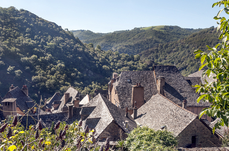 Streets of Conques in the mountains of southern France on a sunny dayの写真素材