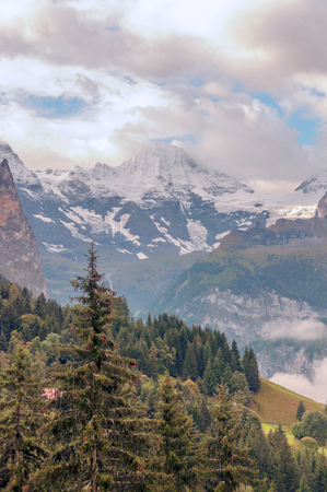 Murren mountains in Switzerland on a cloudy dayの写真素材