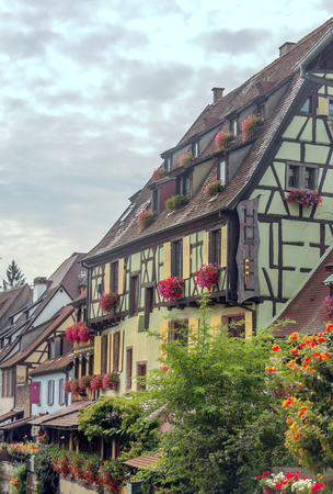 Street in Colmar in Alsace in northern France on a sunny dayの写真素材