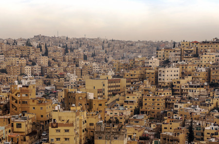 Aerial view of Amman, the capital of jordan on a cloudy dayの写真素材