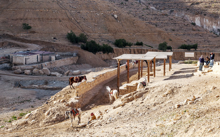 PETRA, JORDAN-FEBRUARY 2015. Tourists on horseback in Petra in Jordan.のeditorial素材