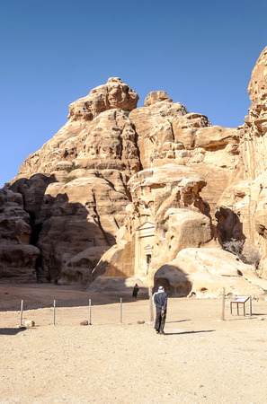 PETRA, JORDAN-FEBRUARY 2015. Tourists in Petra in Jordan .. Petra is an important archaeological site in Jordan, and the capital of the ancient Nabatean kingdom, whose inhabitants called it Raqmu. Petra is not a city built with stone but, literally, excavのeditorial素材