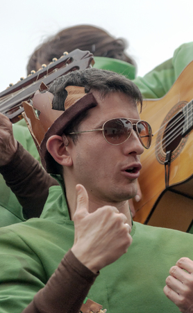 CADIZ, ANDALUSIA, SPAIN-FEBRUARY 2015. Anonymous people disguised singing in the Carnival of Cadiz, Spain.のeditorial素材