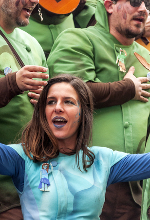 CADIZ, ANDALUSIA, SPAIN-FEBRUARY 2015. Anonymous people disguised singing in the Carnival of Cadiz, Spain.のeditorial素材