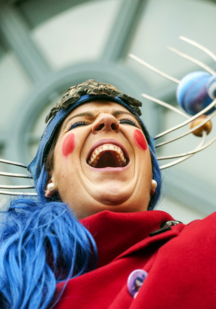 CADIZ, ANDALUSIA, SPAIN-FEBRUARY 2015. Anonymous people disguised singing in the Carnival of Cadiz, Spain.のeditorial素材