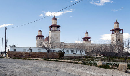 Al-Husseini mosque in Amman the capital of Jordan on a sunny day. Two slender minarets mark the presence of the al-Husseini Mosque (access forbidden to non-Muslims), the most venerated in the city and in Ottoman style, although it was rebuilt in 1924 on tのeditorial素材