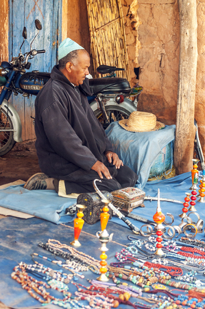 MARRAKESH, MOROCCO - JULY 2015. Streets of Marrakesh with anonymous people walking through them. The city has the largest traditional market in the country and one of the busiest squares in Africa and the world. It possesses numerous monuments heritage ofのeditorial素材