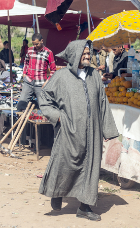 MARRAKESH, MOROCCO - JULY 2015. Streets of Marrakesh with anonymous people walking through them. The city has the largest traditional market in the country and one of the busiest squares in Africa and the world. It possesses numerous monuments heritage ofのeditorial素材