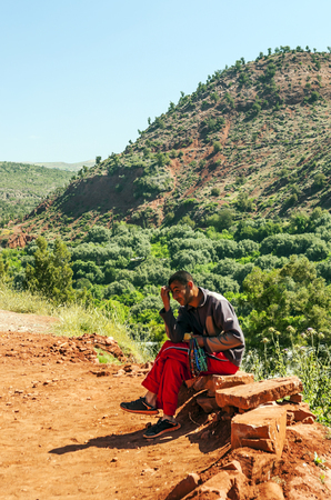 MARRAKESH, MOROCCO - JULY 2015. Streets of Marrakesh with anonymous people walking through them. The city has the largest traditional market in the country and one of the busiest squares in Africa and the world. It possesses numerous monuments heritage ofのeditorial素材