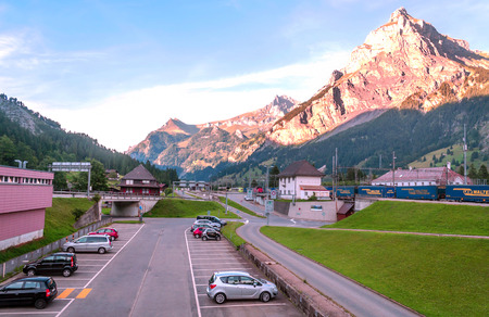BERNE, SWITZERLAND-SEPTEMBER 2015. Cars circulating around the Swiss city of Bern on a sunny day. It is surrounded by the mountains of the Alps.のeditorial素材
