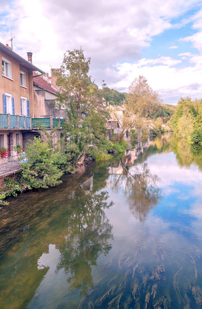 Indre is a department of France located in the Center-Valle de Loire region. Its name is due to the Indre River, which crosses this department. You can see the houses on the banks of the river on a sunny day.の写真素材