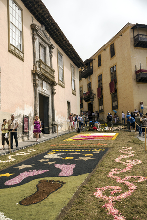 LA OROTAVA CANARY ISLAND SPAIN - JUNE 2016. The people of the town working on the day of Corpus Christi in the flower carpets.のeditorial素材