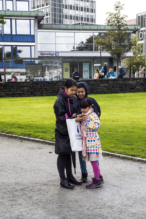 Stavanger, Norway-September 2016. Anonymous person walking around Stavanger. Stavanger is a city in southwestern Norway. The cathedral of Stavanger, located in the center, was erected at the time of the founding of the city in the 12th century. The Stavanのeditorial素材