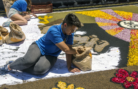 LA OROTAVA CANARY ISLAND SPAIN - JUNE 2018. The people of the town working on the day of Corpus Christi in the flower carpets.のeditorial素材