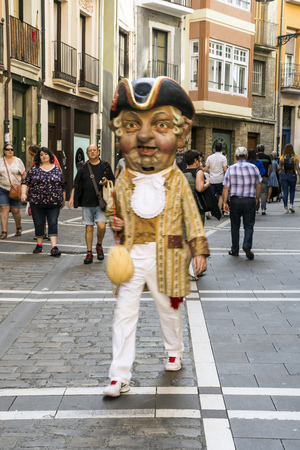 Pamplona, Navarra, Spain-September 2018. Streets of Pamplona in Navarre with people walking and buildings on both sides. Pamplona, capital of the province of Navarra, is a city in northern Spain. It is known mainly for the celebration of bullfights (feastのeditorial素材