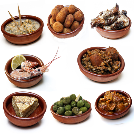 Composition of spanish food dishes surrounded by white backgroundの写真素材