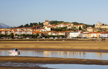 Town near the coast in the north of Spain in a sunny day. ItÂ´s surrounded by nature.