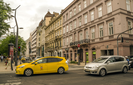 Budapest, Hungary-June 2019. Street of Budapest in Hungary with people in them in a cloudy day. You can see the city life..のeditorial素材