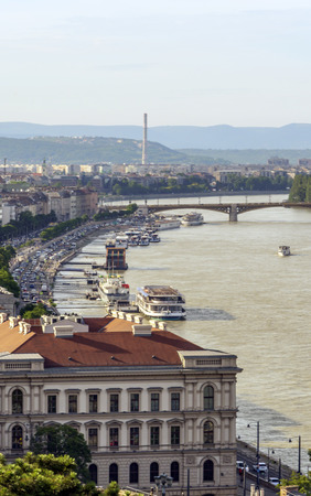 Budapest, Hungary - June 2019. Danube river in the city of Budapest. You can see the river life and the historical building in the background.のeditorial素材