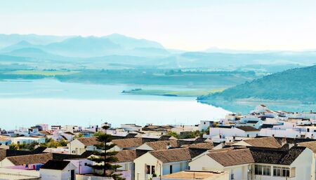 Lake surrounded by vegetation located in the Spanish town of Bornos in a sunny day