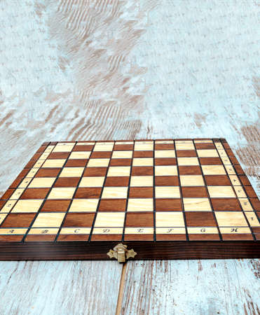 Chess pieces on a wooden board