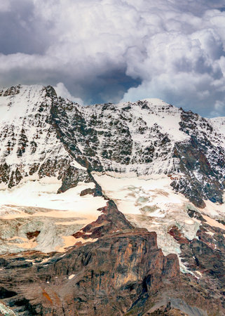 European alps in Switzerland in a cloudy day.の写真素材