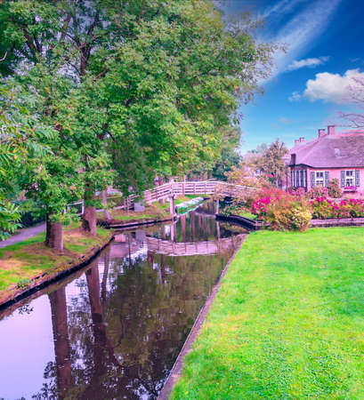 Water canal in Netherland on a cloudy dayの写真素材