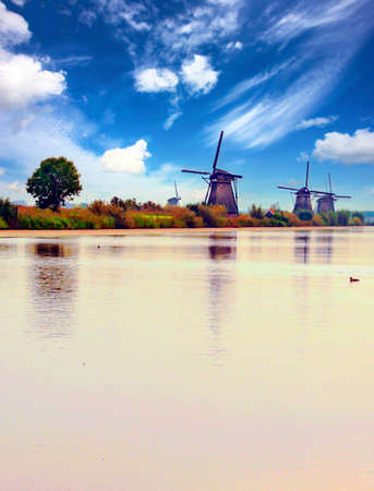 Mills in Kinderdijk in Netherland on a cloudy dayの写真素材