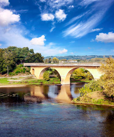 River in Aquitaine in the south of France on a cloudy day.の写真素材