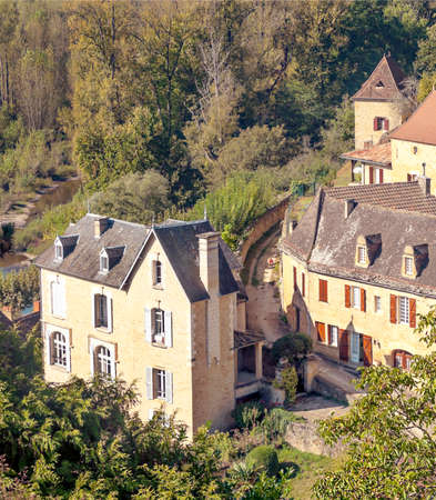 Medieval village of Aquitaine with its stone houses in the south of France on a sunny day.