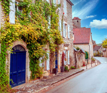 Medieval village of Aquitaine with its stone houses in the south of France on a sunny day.のeditorial素材