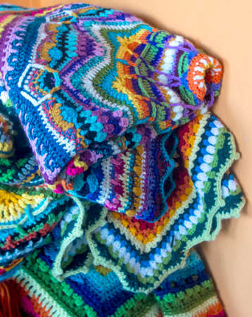 Colorful wool blankets forming a background