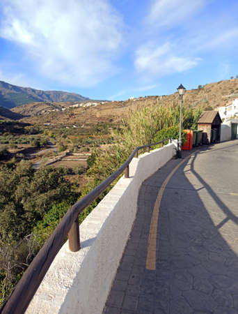 Creek in nature surrounded by vegetationの写真素材