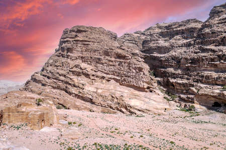Ruins of the ancient city of Petra in Jordan in a sunny day. Petra is an important archaeological site built with stone.の写真素材