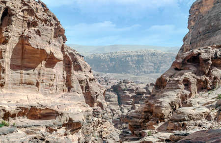 Ruins of the ancient city of Petra in Jordan in a sunny day. Petra is an important archaeological site built with stone.の写真素材