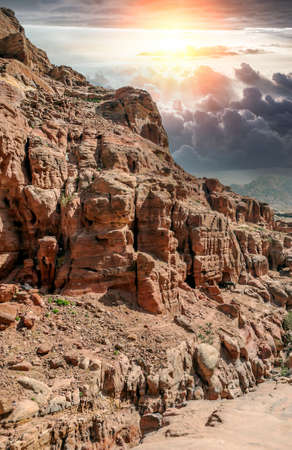 Ruins of the ancient city of Petra in Jordan in a sunny day. Petra is an important archaeological site built with stone.の写真素材
