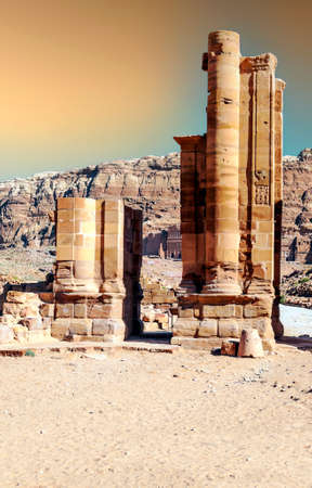 Ruins of the ancient city of Petra in Jordan in a sunny day. Petra is an important archaeological site built with stone.の写真素材