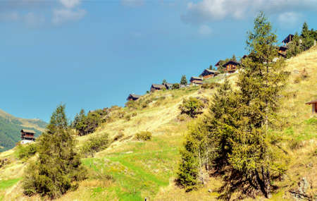 Mountains of the Swiss Alps in the Saint Luc valley on a sunny day.