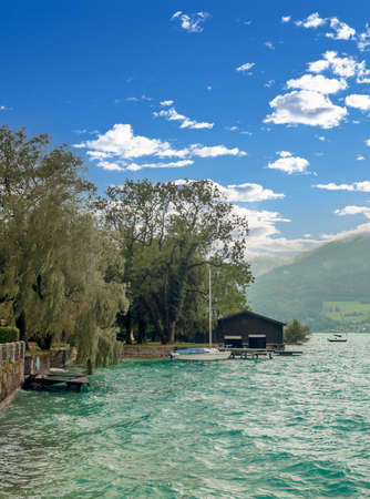 Alpbach lake in the austrian alps on a sunny day.の写真素材