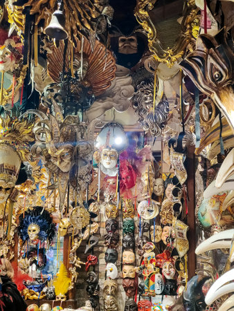 Venice, Italy - April 2023. Carnival mask shop with souvenir in the street of Venice in a sunny dayのeditorial素材