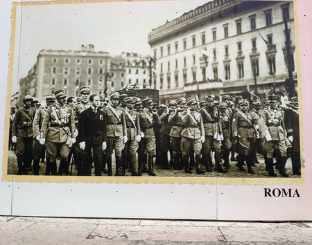 Rome, Italy - April 2023. Advertising photo mural on a wall in the north of Italy in a sunny dayのeditorial素材