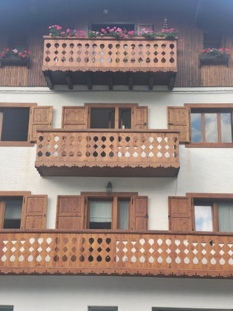 Wooden balconies on a building in the Austrian city of Salzburgの写真素材