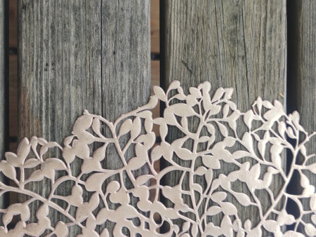 Handmade wood carving art on the wall. Handmade crafts.